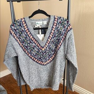 Gray V-Neck Sweater with Colorful Pattern